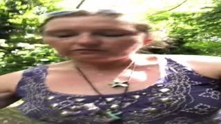 Unbridled arousal on a forest stroll: fingers teasing, brief dress flaunting, primal urge commanding