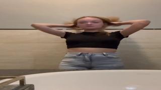 Sexy little nymph gets naked, gets wild and wets in a dark nightclub