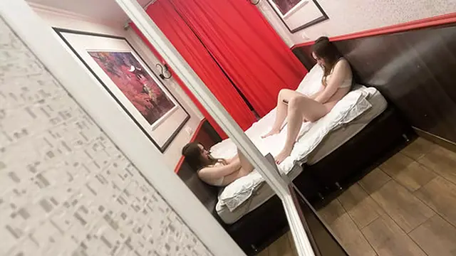 Two lovers locked in intimate passion at home