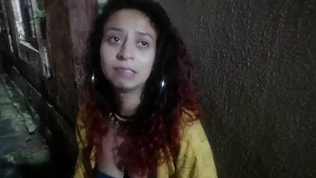 Teen seductress craving desire on the sidewalk